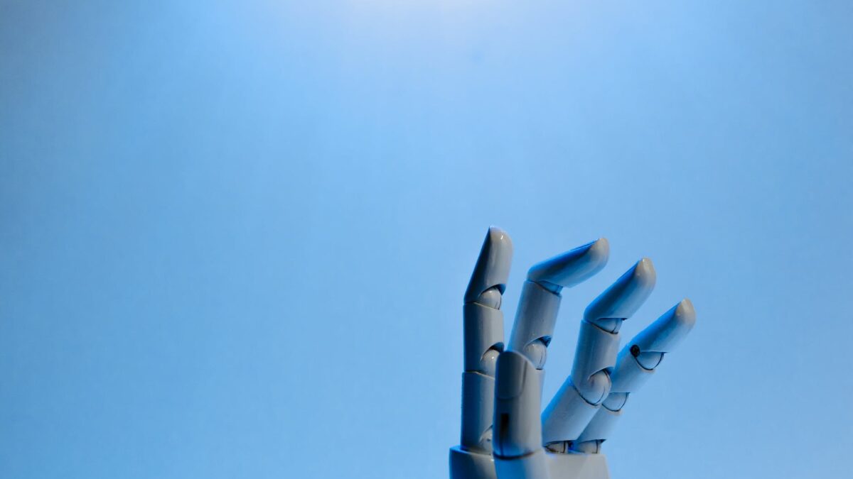 robot fingers on blue background